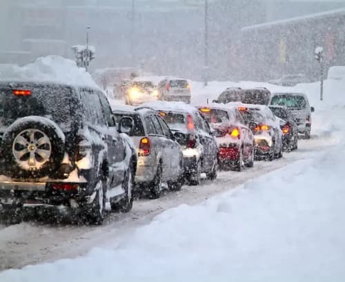 Vehicles in a snow storm